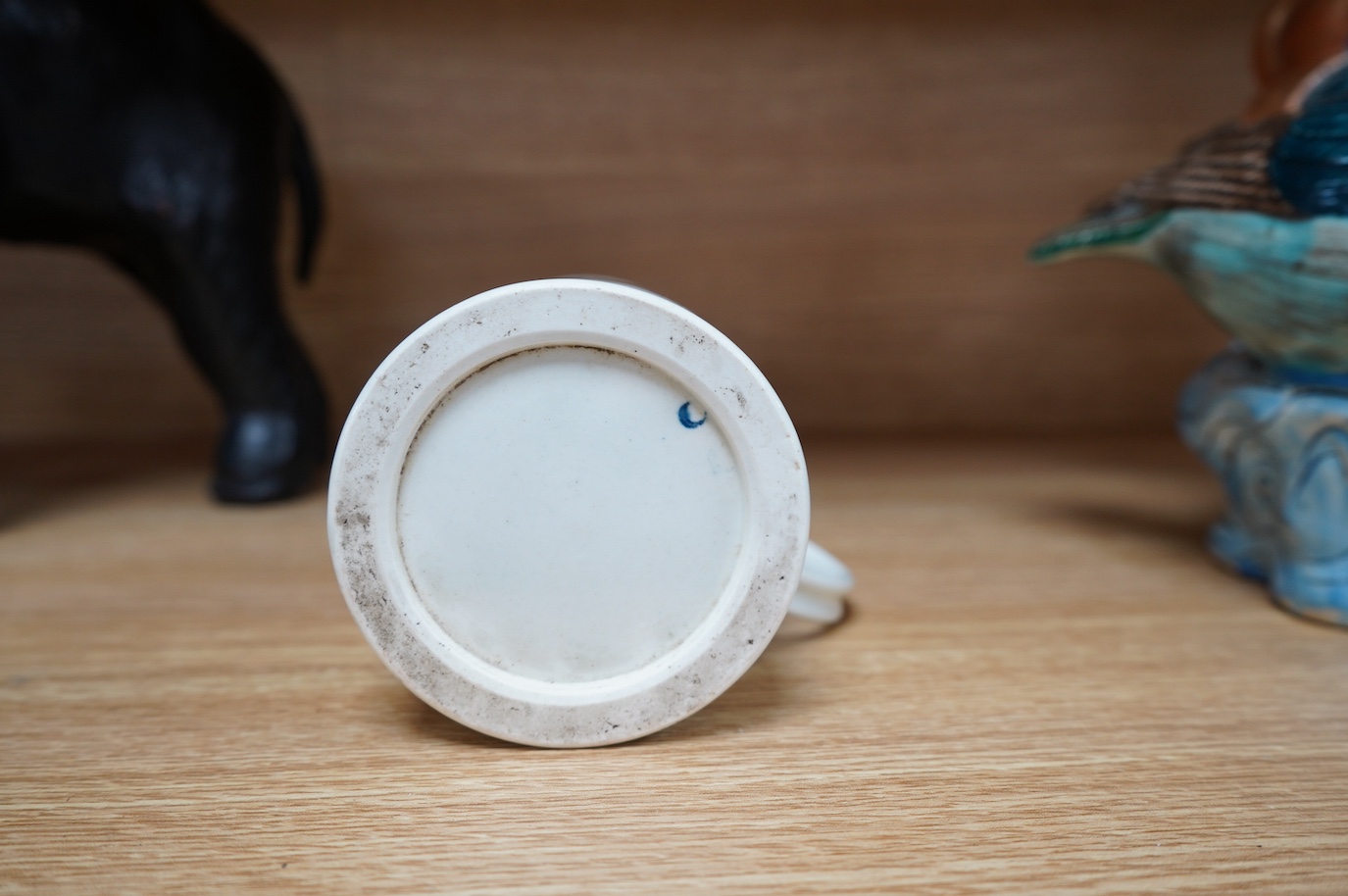 A Worcester blue and white porcelain mug, c.1775, 11.5cm high. Condition - fair to good.